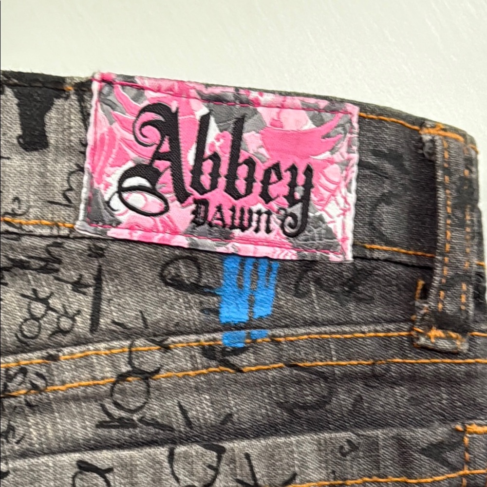 Abbey Dawn YTK Black  Graphic Jeans.
Reasonable Offers will be considered.